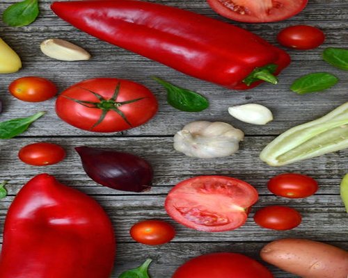 Fresh colorful vegetables on a wooden table